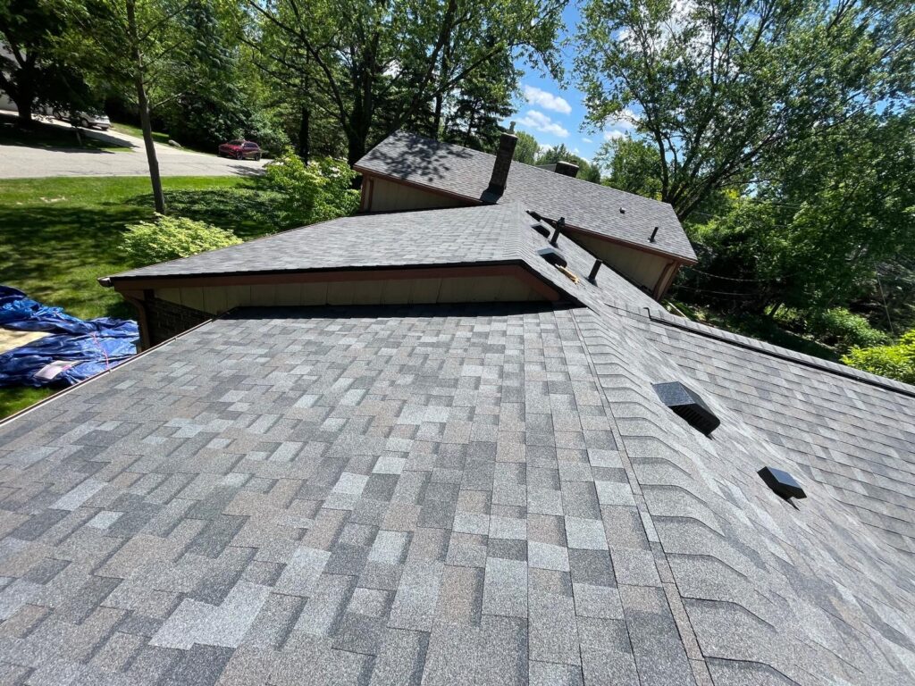 Freshly replaced shingles on a roof