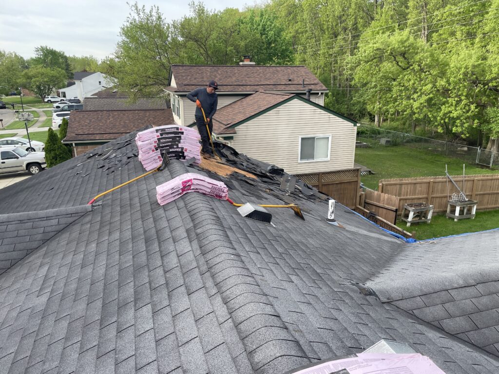 Old shingle on roof, ready to be torn off