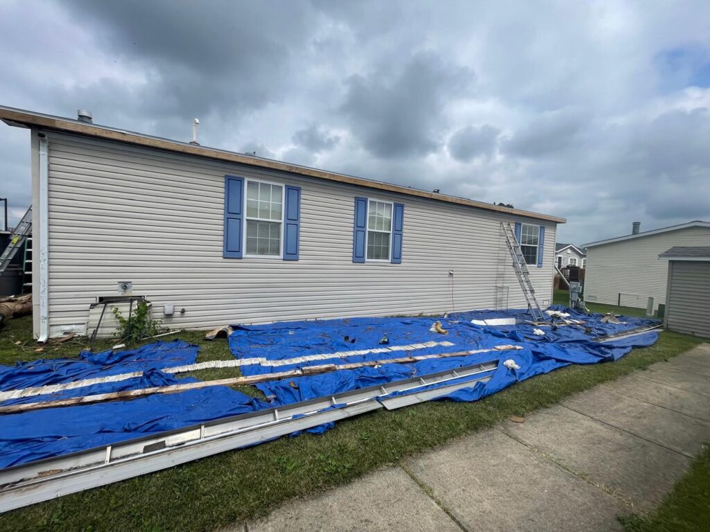 gutters removed from home to replace the facia