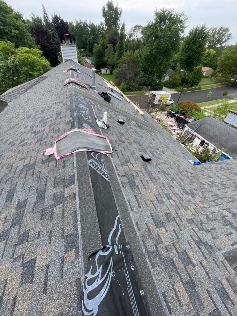 west facing roof ridge with new shingles